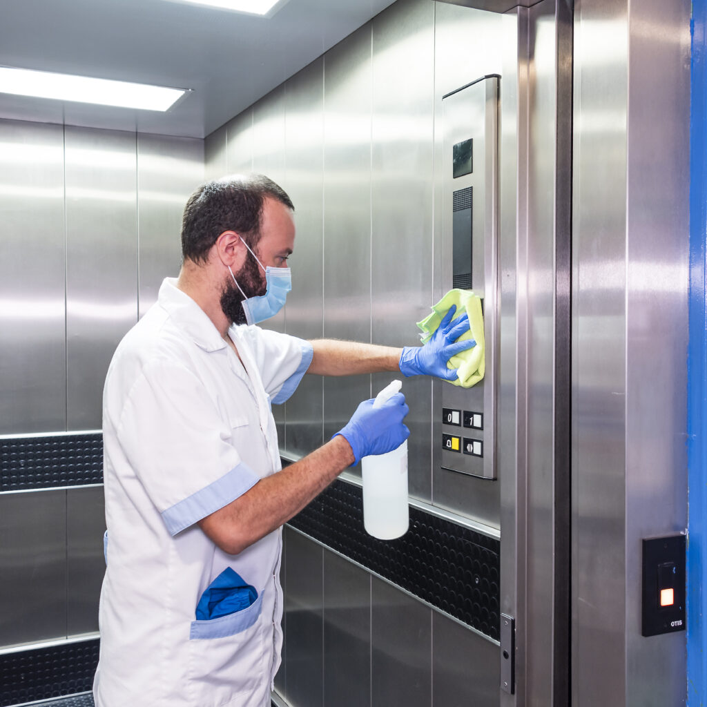 cleaning staff performing disinfection and hygiene work in hospital facilities