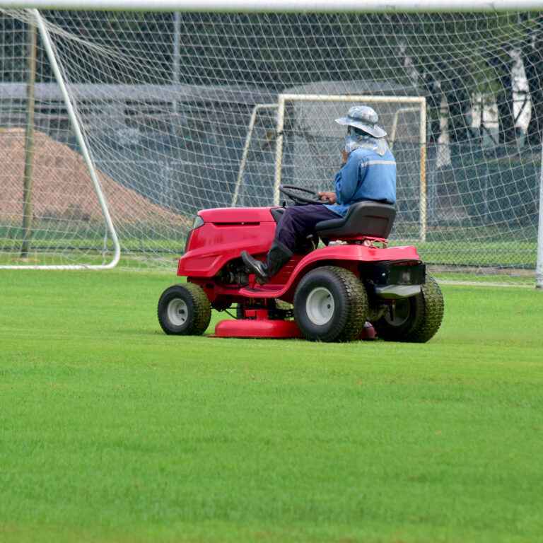 mower-with-driver-take-care-mowing-football-stadium-always-looks
